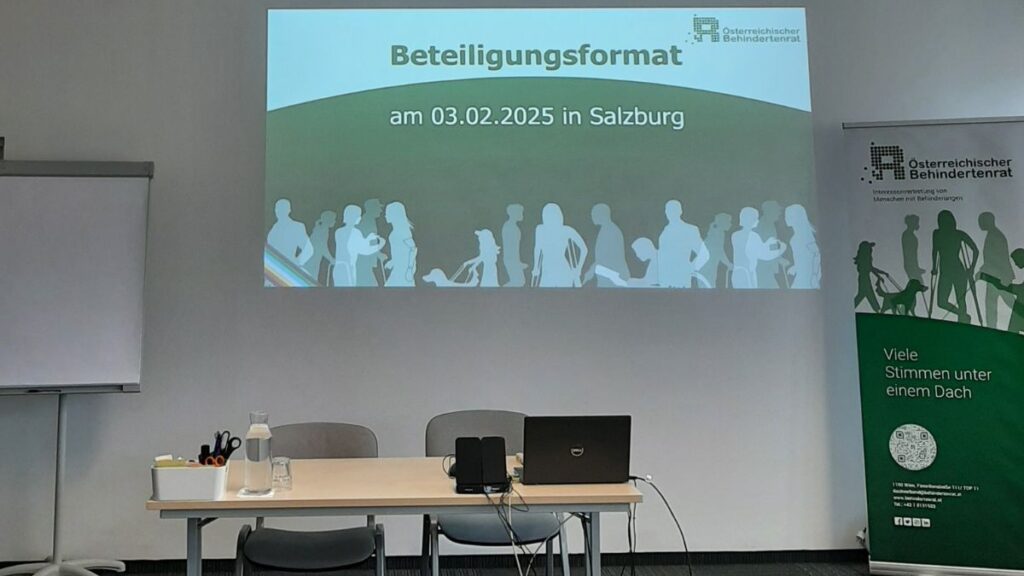 Präsentation an einer Wand: "Beteiligungsformat am 03.02.2025 in Salzburg"